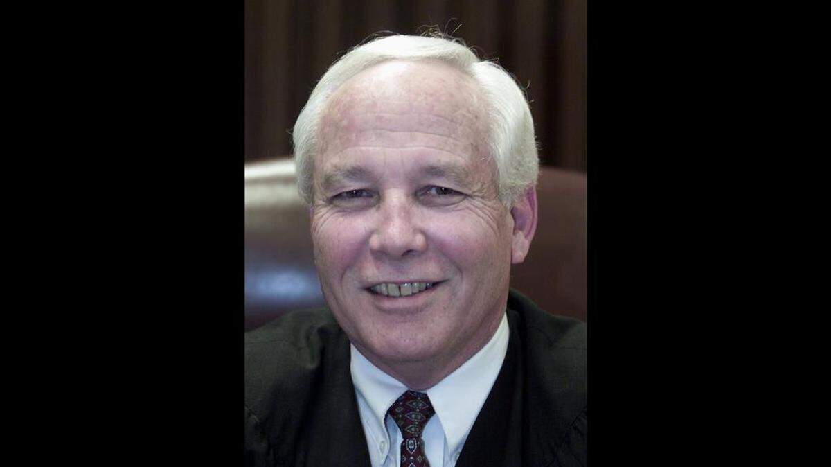 Justice Gene Gomes