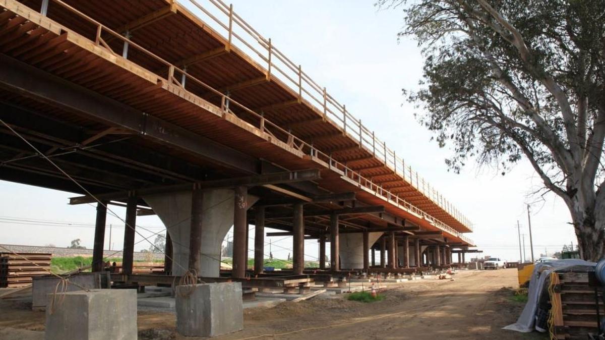 An elevated bridge, or viaduct, for California’s high-speed rail project is under construction over the Fresno River east of Madera. An April 20 open house is scheduled in Madera to provide residents with information about the construction project.