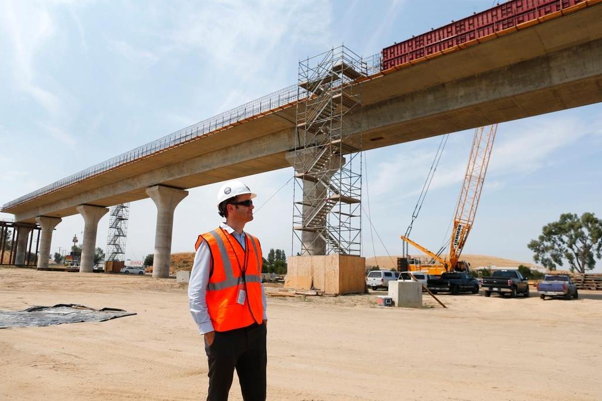 Robert Campbell, transportation engineer for the California High-Speed Rail Authority, stands near the Cedar Viaduct under construction near Highway 99 in Fresno on July 10.