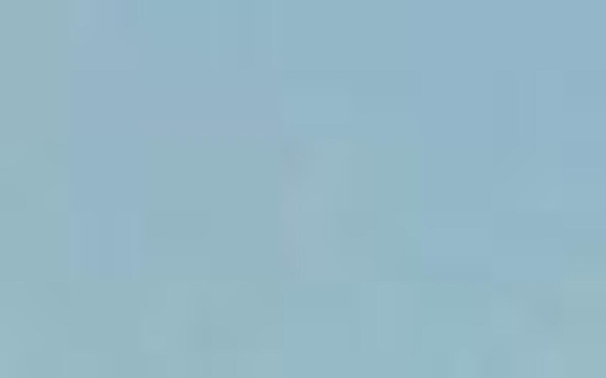 
An artist’s depiction of a high-speed train zooming through downtown Fresno.
