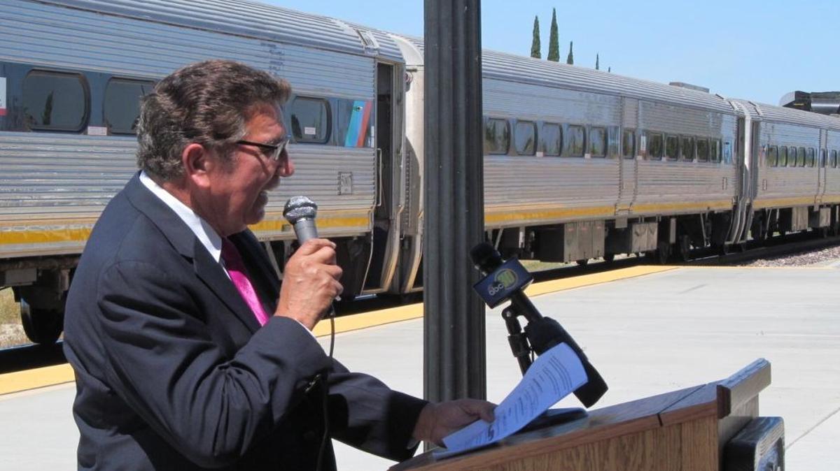 Madera County Supervisor Max Rodriguez talks at Madera’s Amtrak train station about a future high-speed rail stop for passengers connecting between the two systems. The state hopes to launch high-speed rail service in 2025 between San Jose and Kern County.