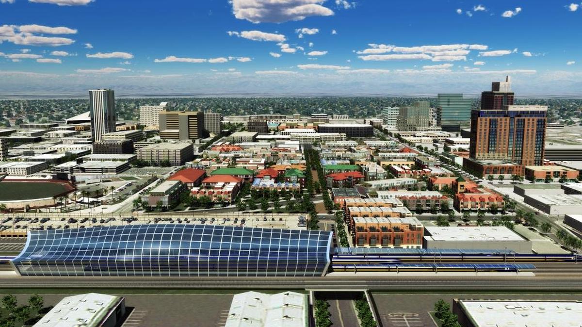 A conceptual rendering of a future high-speed rail station in downtown Fresno suggests new development in the area surrounding the facility. Current plans are for the station to be built northwest of the Chukchansi Park baseball stadium.