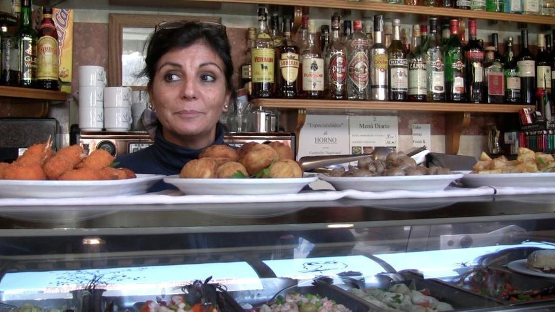 
Merceded Santos, a restaurant owner in Barcelona, says she likes riding the trains but construction for lines under her business has down the street, making it hard to attract customers.
