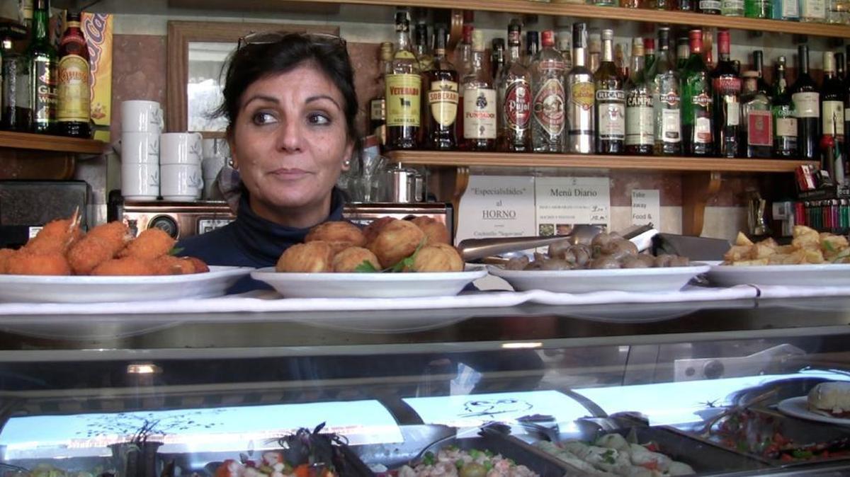 
Merceded Santos, a restaurant owner in Barcelona, says she likes riding the trains but construction for lines under her business has down the street, making it hard to attract customers.
