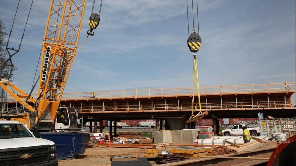 Construction continues on a high-speed rail viaduct over the Fresno River in Madera County.