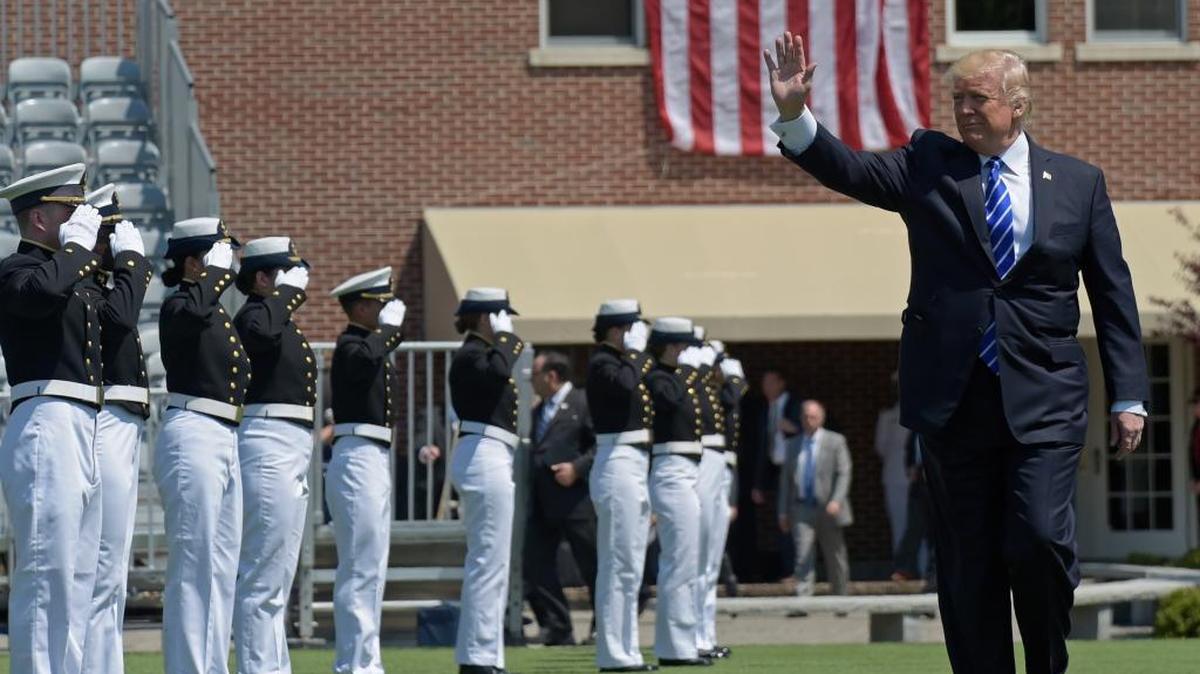 President Donald Trump waves as he arrives to give the commencement address at the U.S. Coast Guard Academy in New London, Conn., Wednesday, May 17, 2017. During the speech, the president said “No politician in history – and I say this with great assurity (sic) – has been treated worse or more unfairly.”