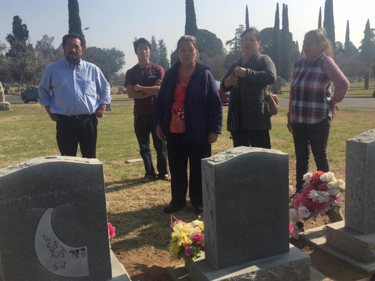 Several Hmong residents came to Mountain View Cemetery in Fresno to check the graves of their loved ones after Facebook photos showed moved headstones.