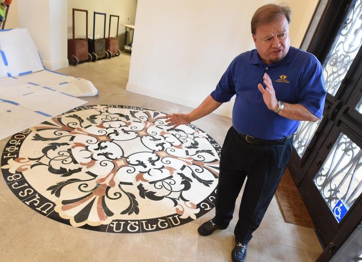 Dennis Bacopulos, The Vineyards developer, proudly shows an intricately designed and carved mosaic medallion – the Armenian alphabet circling it – in the entryway of the luxury senior living community, a $42 million expansion of the California Armenian Home.