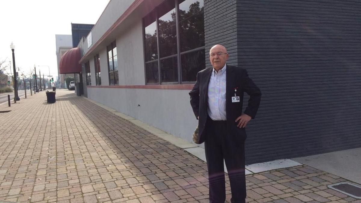 Fresno County Assessor-Recorder Paul Dictos stands in front of an office building on Van Ness Avenue earlier this year. He wanted to move the Fresno County Recorder’s office to the downtown site, but the amount needed for improvements makes the cost prohibitive, he said.