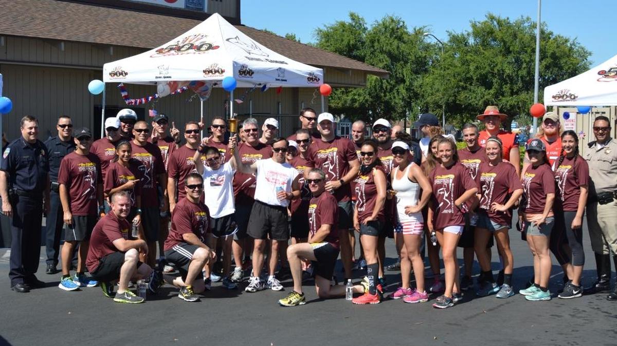 Dozens of residents, athletes and officers from across Fresno and Clovis hit the streets on Thursday to complete a 9-mile race as part of the annual Special Olympics Law Enforcement Torch Run.