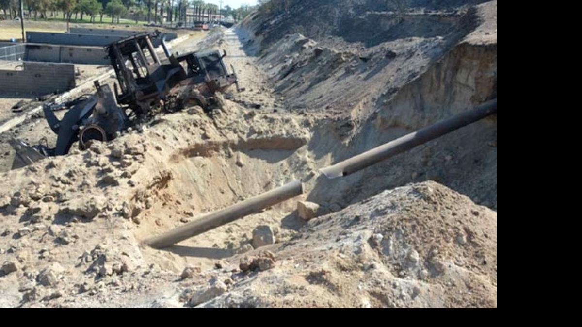 
A photo from a report prepared for the California Public Utilities Commission shows the ruptured gas pipeline, excavated a few days after the April 17 explosion and fire at the Fresno County Sheriff’s Foundation shooting range. One person died and 12 were injured in the blast.
