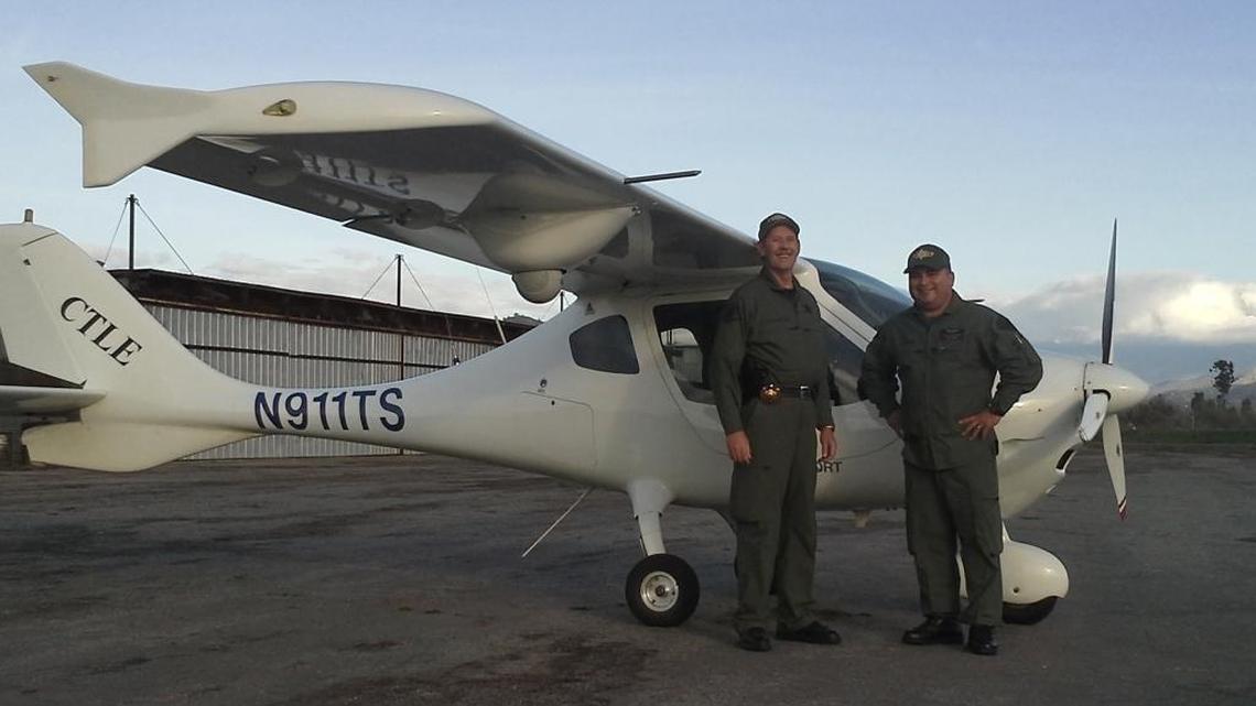 Sheriff’s Deputy Scott Ballantyne and Sheriff’s Pilot James Chavez pose for a photo with Sheriff One. The two men were killed when the light sport aircraft crashed into the side of a mountain along Highway 190 near Lake Success just after 4 p.m. Feb. 10, 2016.