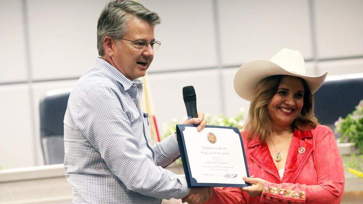 Congressmember John Duarte, R-Modesto, presented a certificate to state Sen. Marie Alvarado-Gil in March. He defended his support during a call to a Fresno radio talk show on Monday of an immigration bill that would allow a path to legal residency for undocumented residents.