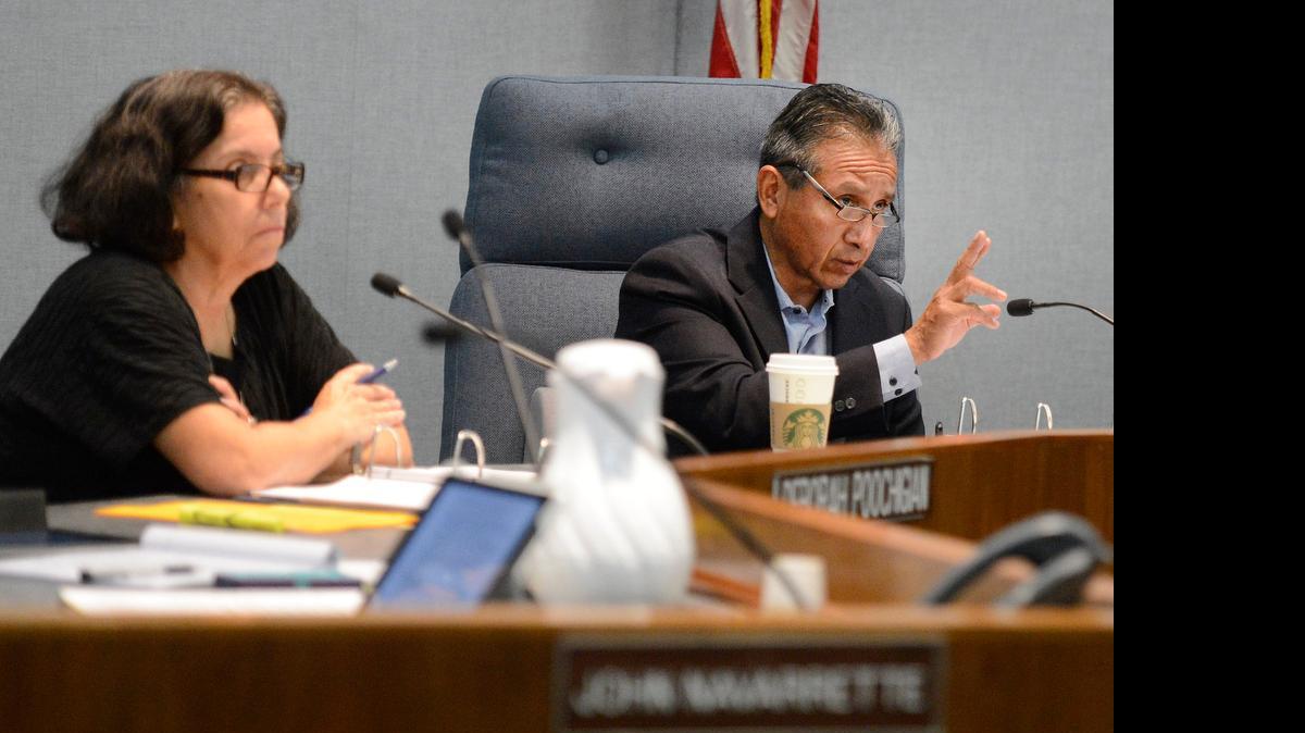 
Fresno County Board of Supervisors members Henry Perea and Debbie Poochigian.
