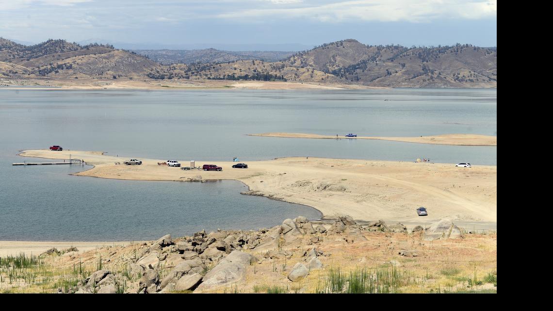 
The obvious signs of the fourth year of serious drought in California are seen as vacationers find their way to the water’s edge at Millerton Lake Monday, June 29, 2015. 
