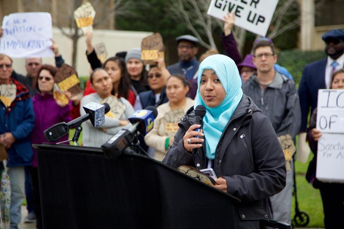 Sukaina Hussain addresses a question at a February 2018 Faith in Fresno rally in front of the Fresno County Sheriff’s office.