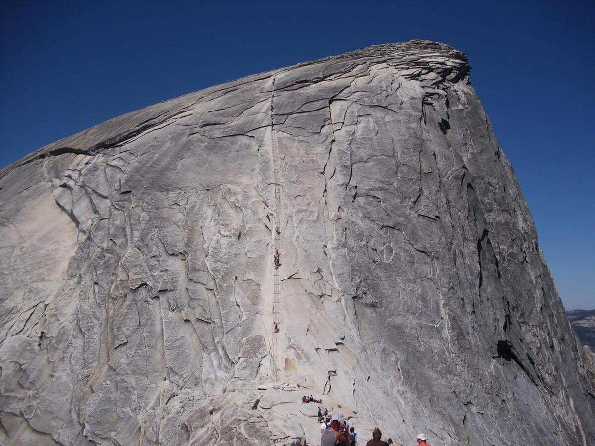 The east face of Half Dome, hidden from the Valley floor, is where the infamous cables section is located that takes hikers up the final 400 feet of the famous Yosemite batholith.