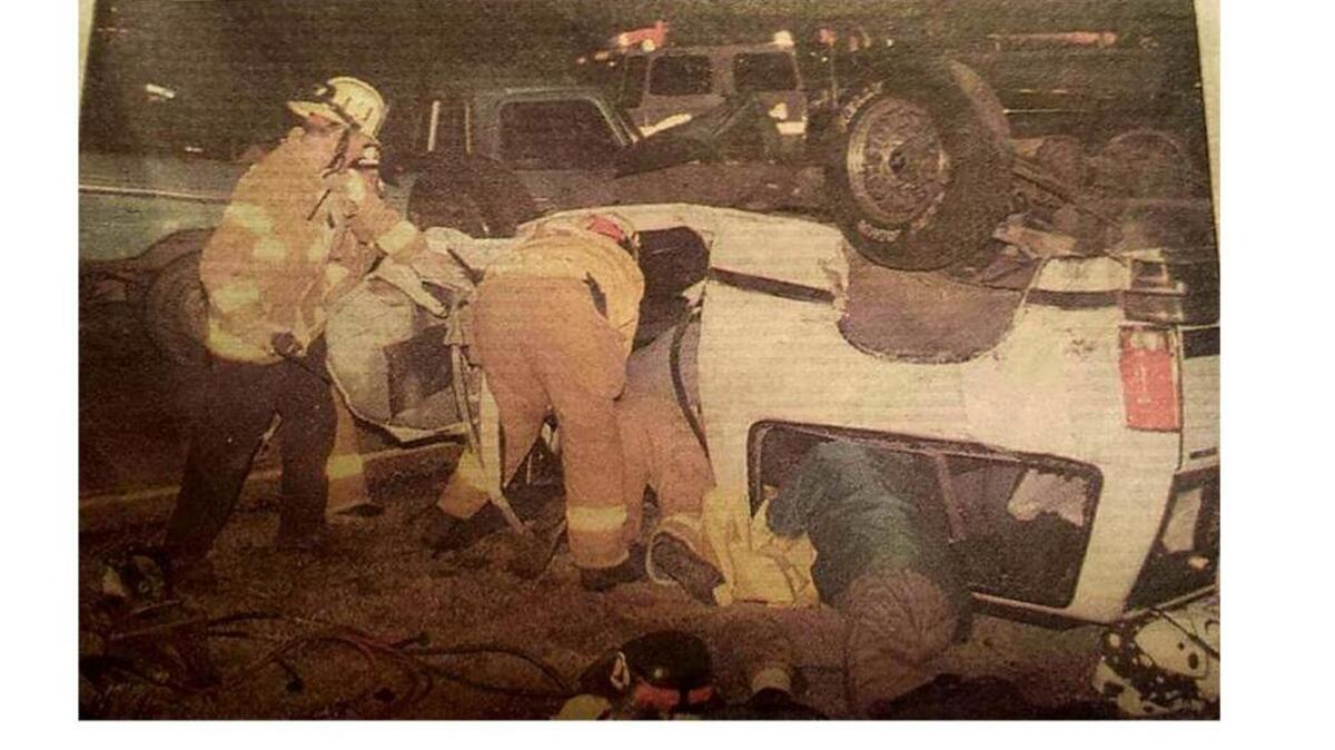 Traci Gallian was in the white vehicle 23 years ago when it was struck by a drunken driver in Morro Bay. Rescuers work to get her out. Gallian survived the crash and went on to to become a CHP officer. The DUI driver died at the scene.