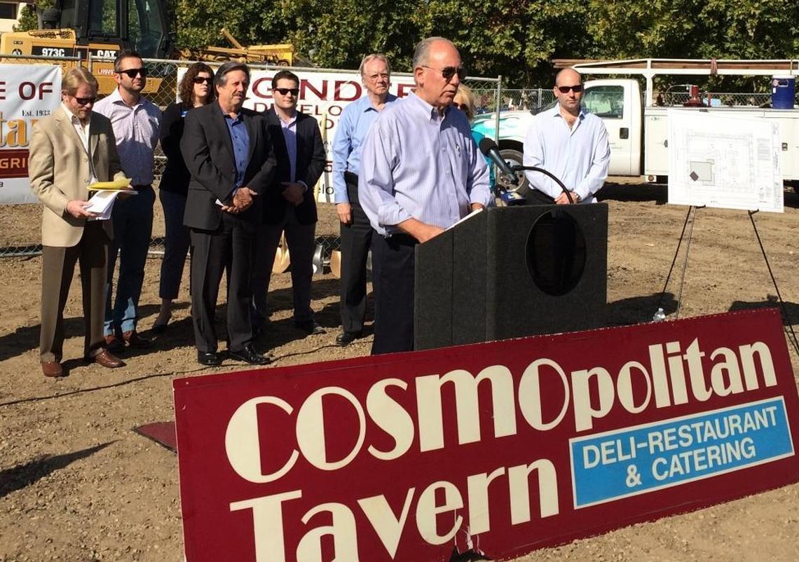 Cosmopolitan Tavern owner Gary Lanfranco speaks as his son Joseph Lanfranco, far right, and community leaders look on at a groundbreaking ceremony for the new restaurant, which relocated from its longtime site at Fresno and G streets to Ventura and O streets, near the Fresno Convention Center.