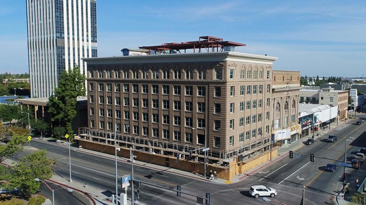 A delay in obtaining tax-credit financing is threatening plans for the Fresno County District Attorney’s Office to relocate into the historic Rowell Building, shown in a September 2017 file photo. The building is at Tulare Street and Van Ness Avenue.