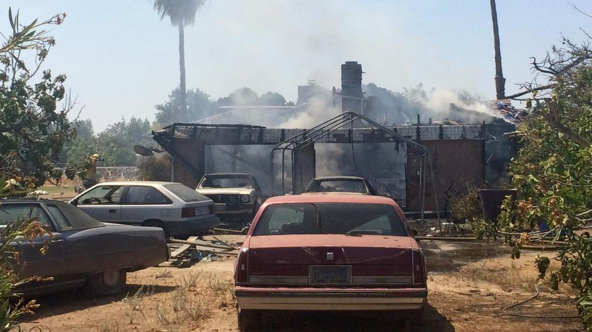 
A fire burned at least 25% of a home northeast of Clovis on Sunday. 
