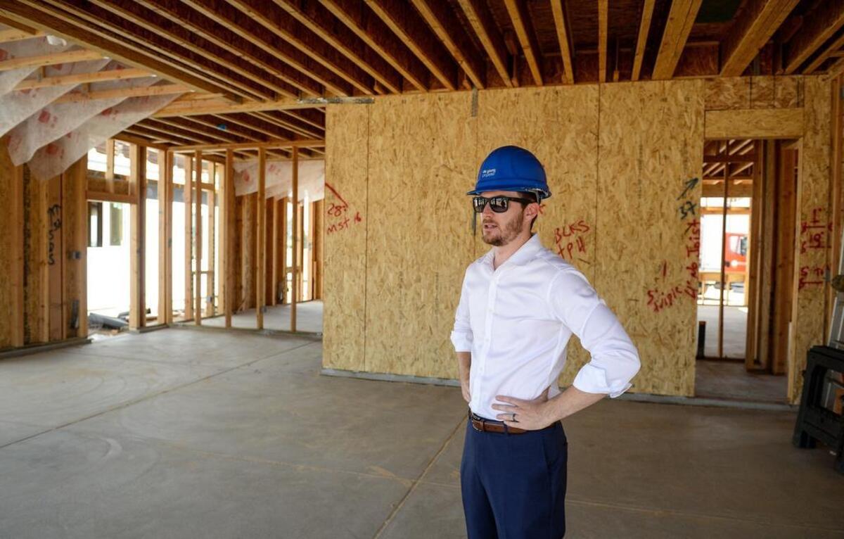 Brandon De Young, executive vice president of De Young Properties, looks over the construction on one of the company’s energy efficient homes east of Clovis. The builder’s new project, RidgeView will feature 58 homes in north Clovis