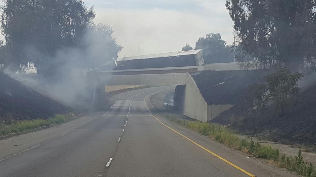 The truck that crashed Wednesday on the Highway 152 westbound transition from Highway 99 left both roads closed for hours.