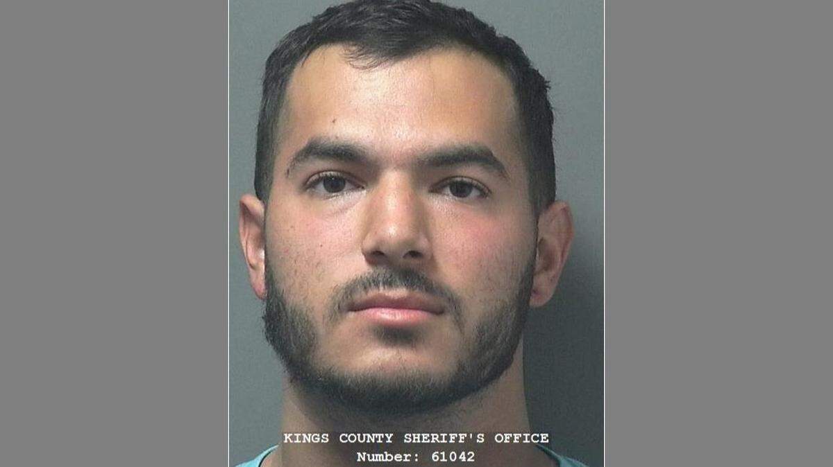 Carlos Garza, 23, was arrested by police in Hanford, CA, for committing lewd acts with a minor.