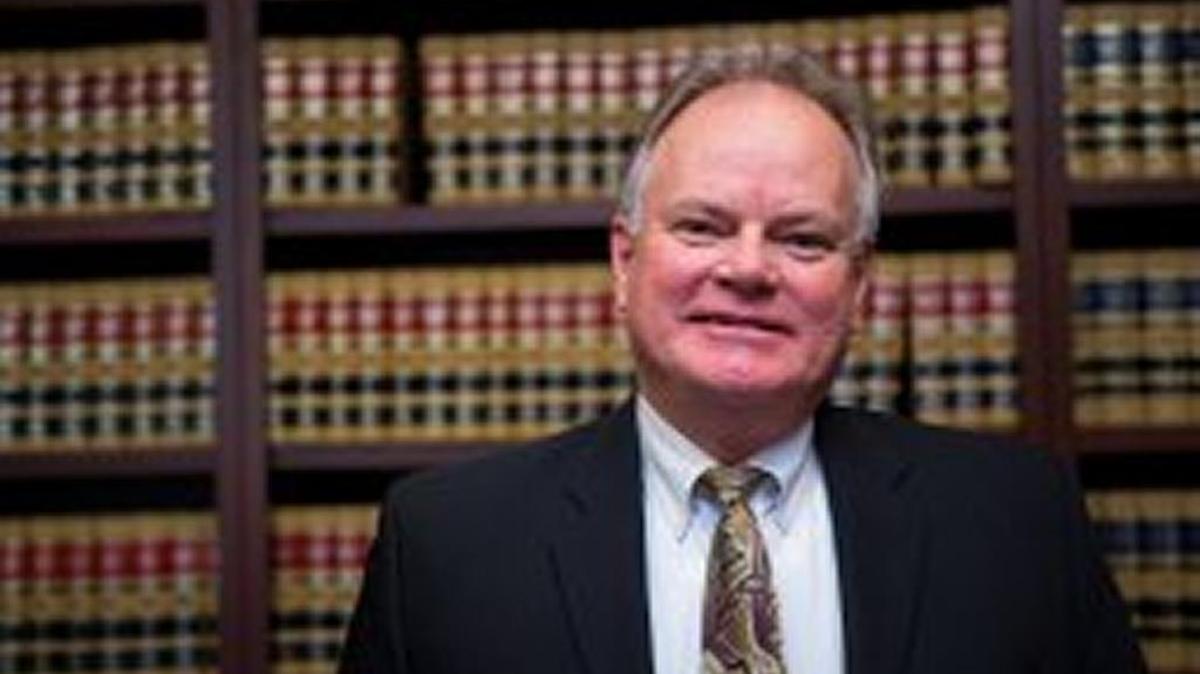 Fresno attorney Jim Wilkins has sued Nationwide and a collection agency on behalf of Madera resident Rebecca McKeever, who contends she was a victim of fraud.