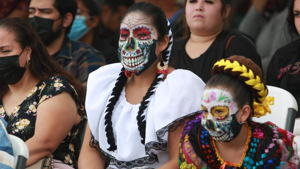 People enjoy the afternoon during the eighth annual Día de los Muertos at the Kings Cultural Center on Oct. 24, 2021 en Armona.