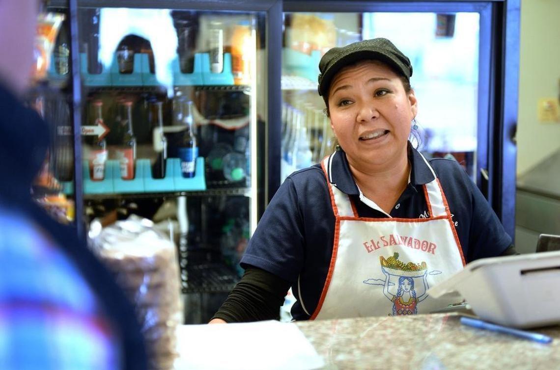 Salvadoran immigrant Flor Rodas takes an order at Morenita Salvadoran restaurant in Mendota on Friday, Jan. 12, 2018. Rodas is a recipient of temporary protection from deportation – a program President Trump announced will end in 2019.