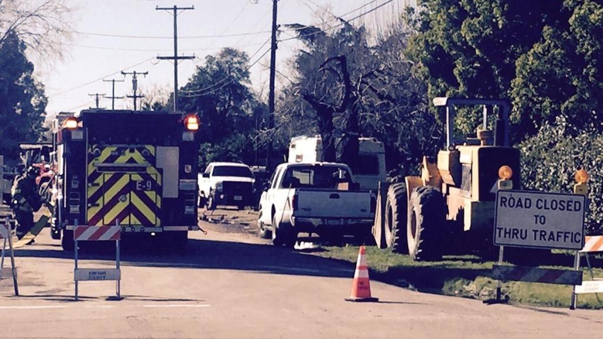 The clean up of a homeless camp west of Highway 99 got delayed when an gas line was ruptured.
