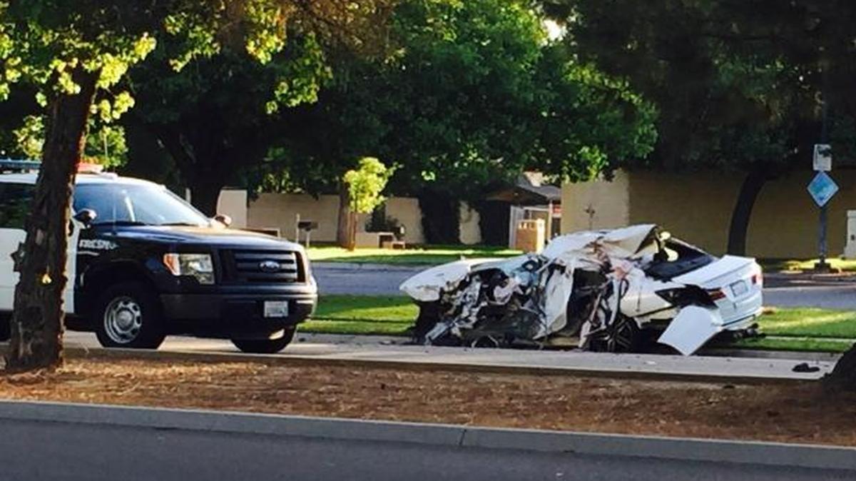 Fresno police investigators at scene of crash in northwest Fresno.
