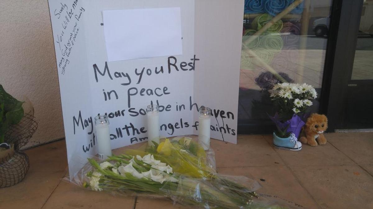 
A memorial to the toddler is at the front of Swim America on Willow Avenue.
