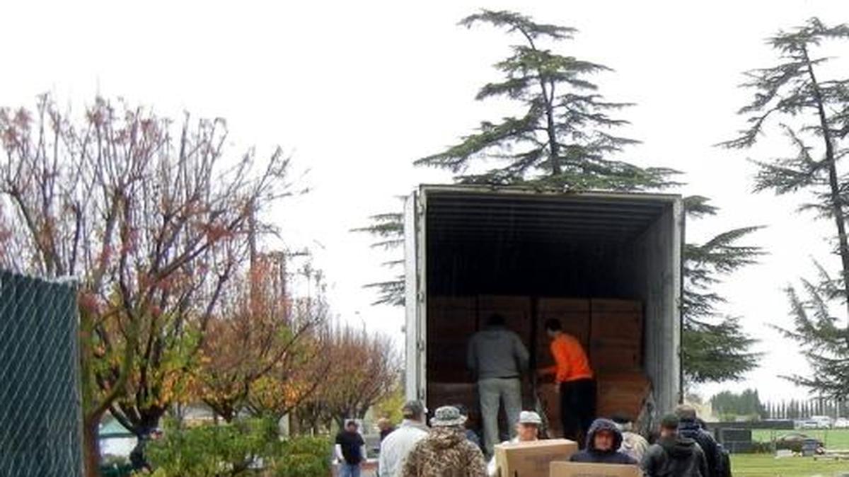 Wreaths are unloaded at Clovis Cemetery on Thursday to be used in Saturday’s event.