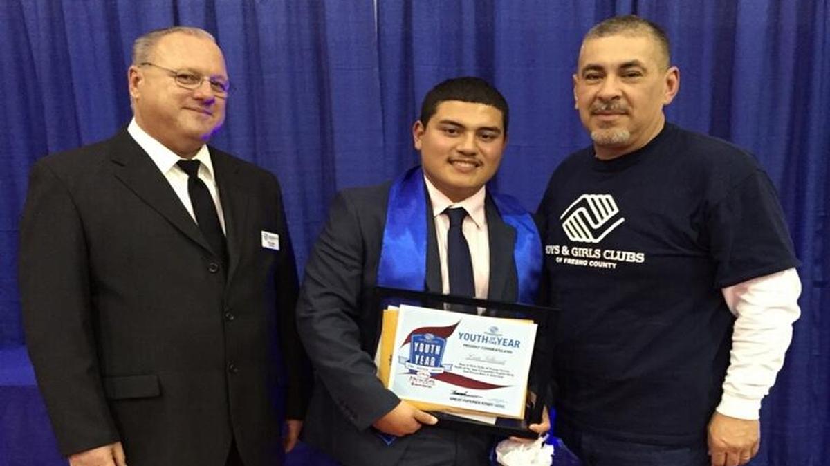 (From left) Ron Zisler, Cristo J. Villaverde and Mark Armenta appear after Villaverde, 18, won the Youth of the Year award from the Boys & Girls Clubs of Fresno County on Jan. 21.