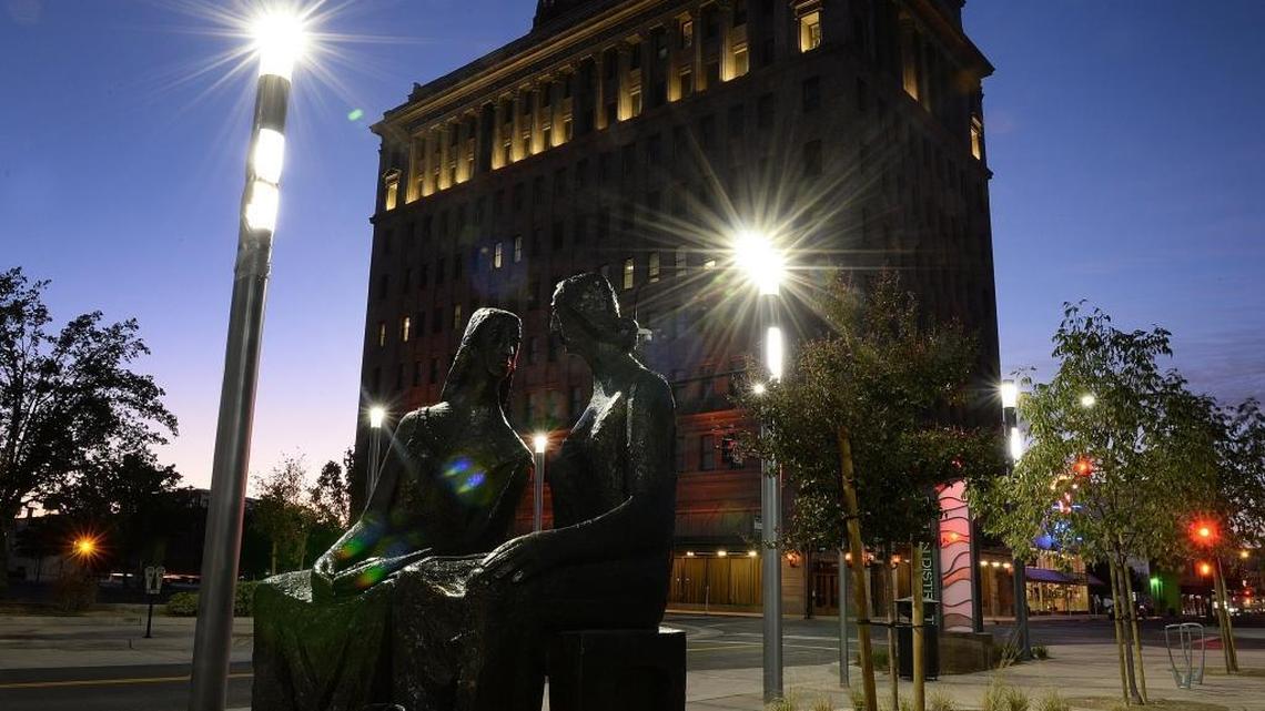 “The Visit,” a bronze sculpture by Valley native Clement Renzi, can be found at the northeast corner of Fulton and Tuolumne streets on the north end of the Fulton Street District in downtown Fresno. The downtown area saw a downturn in crime in 2018, according to police.