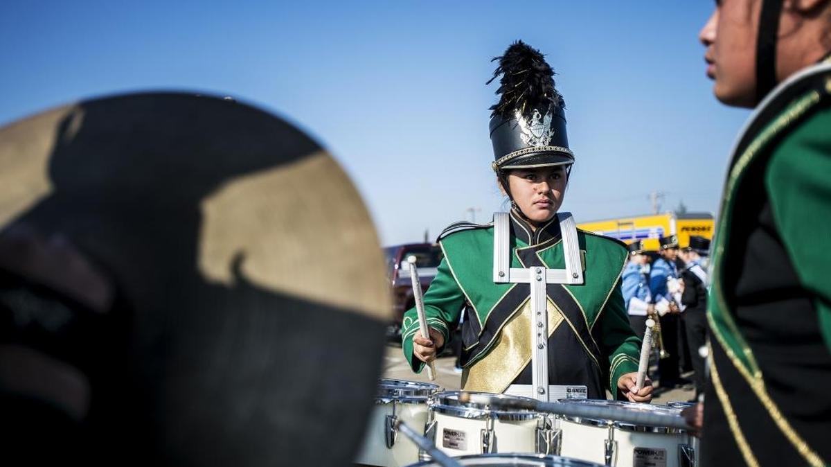 Jefferson Middle School drummer Hannah Kamai practices with the band during the 56th annual Central California Band Review at Golden Valley High School in Merced on Saturday.