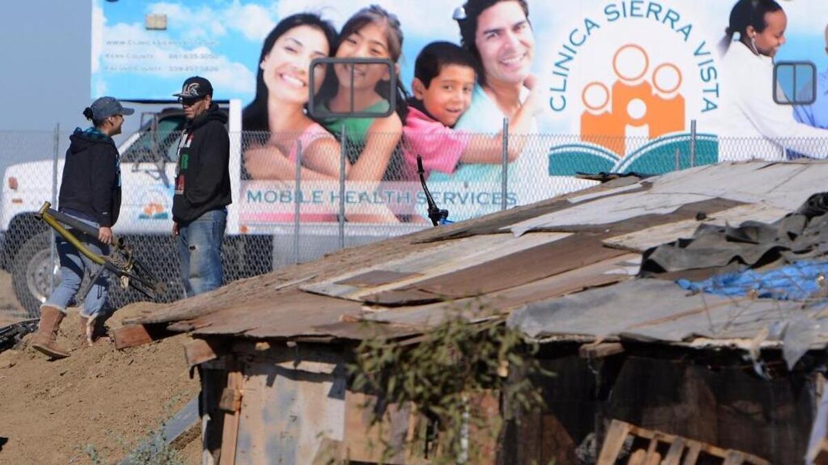 The Clinica Sierra Vista mobile clinic paid a visit to a homeless encampment in a dry ditch at Mendota in October 2015. Fresno County agencies are trying to combat homelessness as encampments grow on rural private properties across the county.