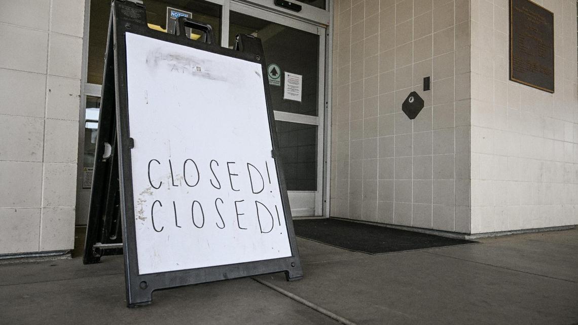 A sign with a handwritten “Closed” sign stands outside Madera Community Hospital’s ER on Monday, July 24, 2023. The hospital closed early this year.