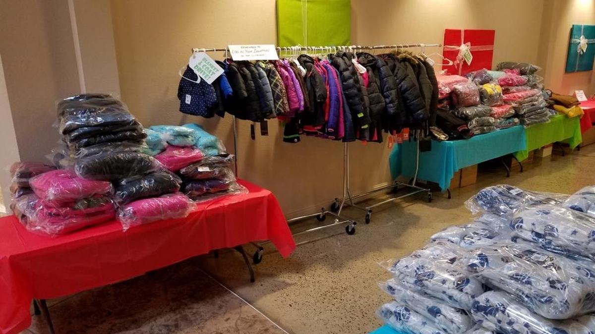 Harris Construction is expected to donate more than 1,000 new or gently-used coats and blankets to Catholic Charities on Tuesday.