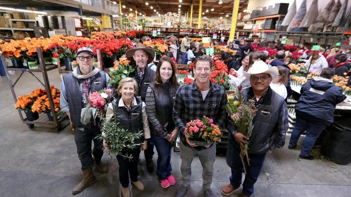 Clovis gardening blogger Susan Phillips, center, joins other California gardeners and TV personality Ty Pennington in the Miracle-Gro Rose Parade float barn in Pasadena on Wednesday, Dec. 30, 2015. The growers, who helped supply material for the float, and Pennington will ride on it New Year’s Day.
