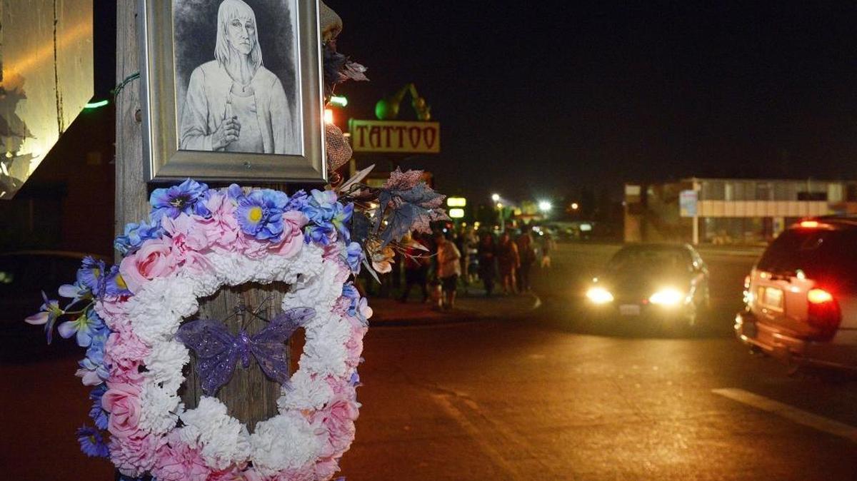 An illustration of Casey Haggard and a memorial hang on a pole near the intersection of Blackstone and Cornell avenues in Fresno, where she was fatally stabbed in July 2015. A vigil and march was held by the local transgender community on Friday commemorating Casey’s life and calling for justice for her killer who has not been arrested.