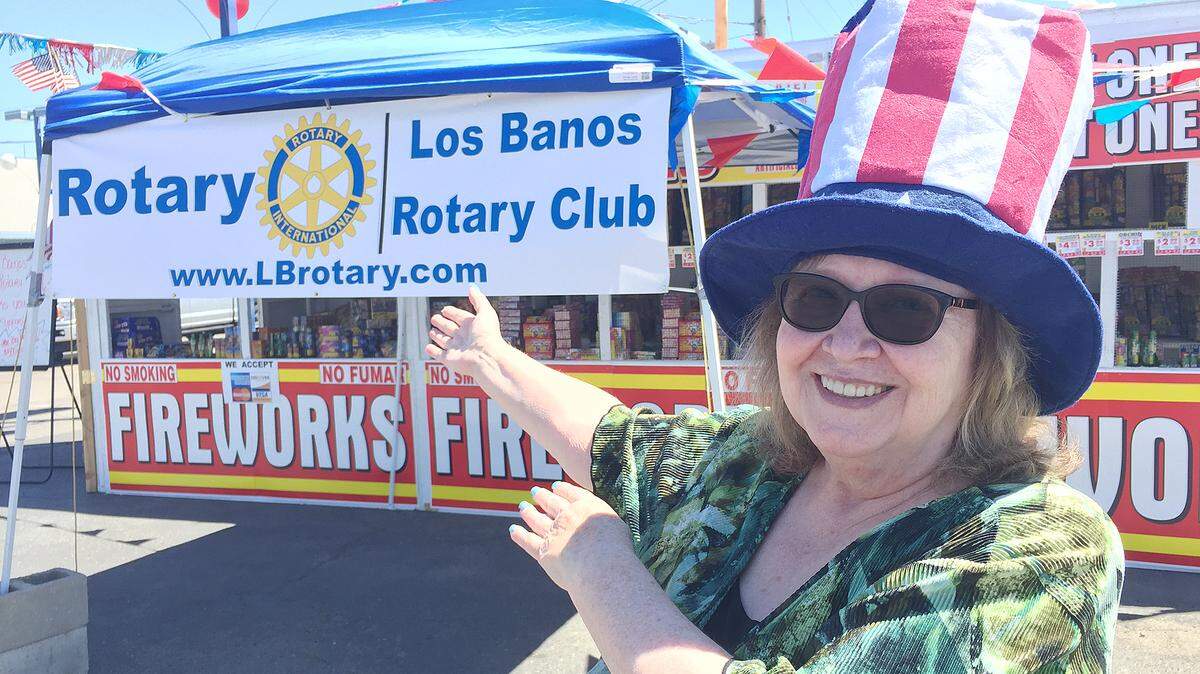 Pat Selinger points to the Los Banos Rotary fireworks booth, the last time the local club had a booth. This year the Rotary will be selling fireworks in the Walmart parking lot.”