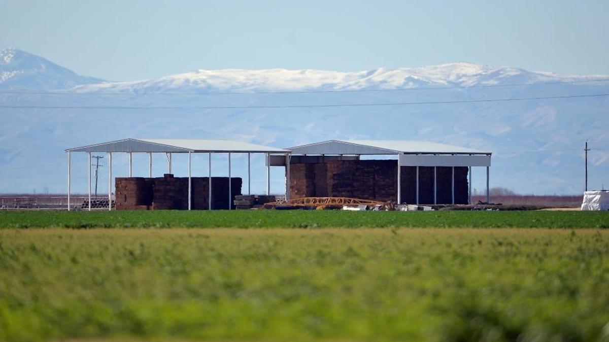 Snow is visible on Diablo Range peaks from South McMullin Grade west of Fresno Monday afternoon.