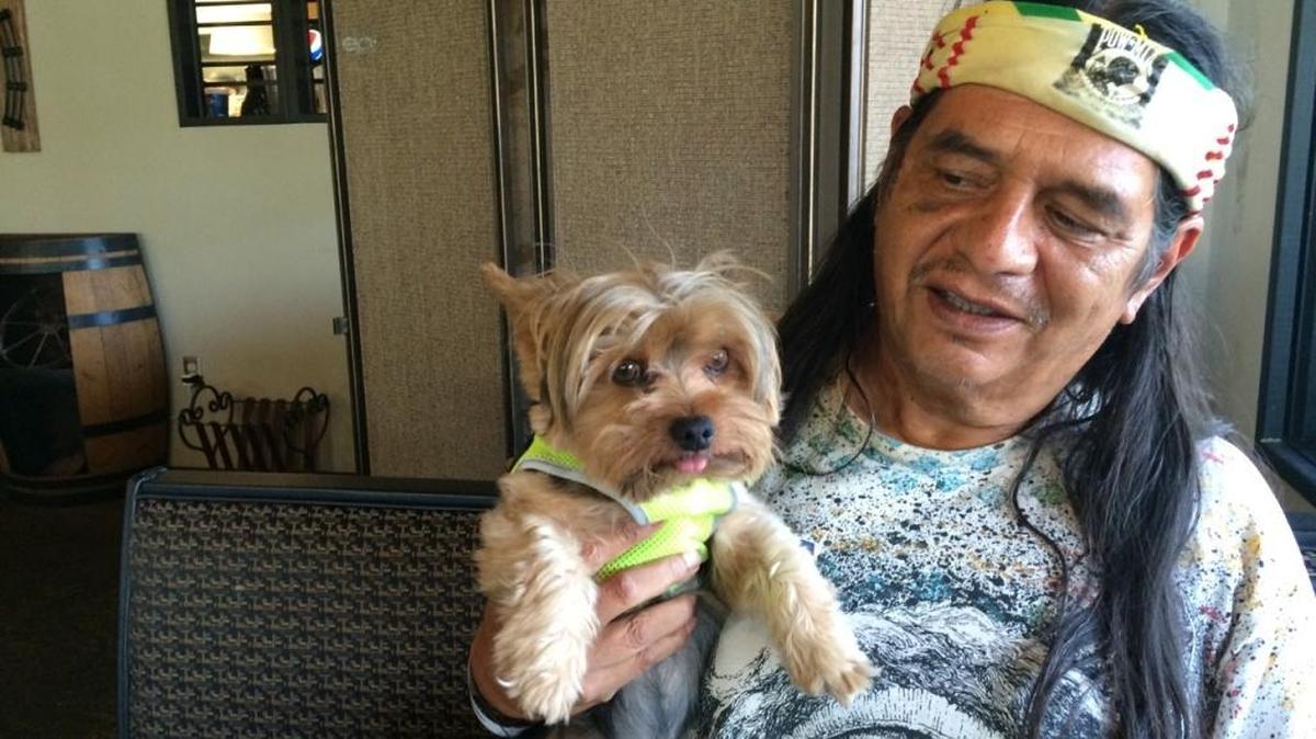 
Larry Yepez and his Yorkshire terrier, Benji, survived a bear attack in August. 
