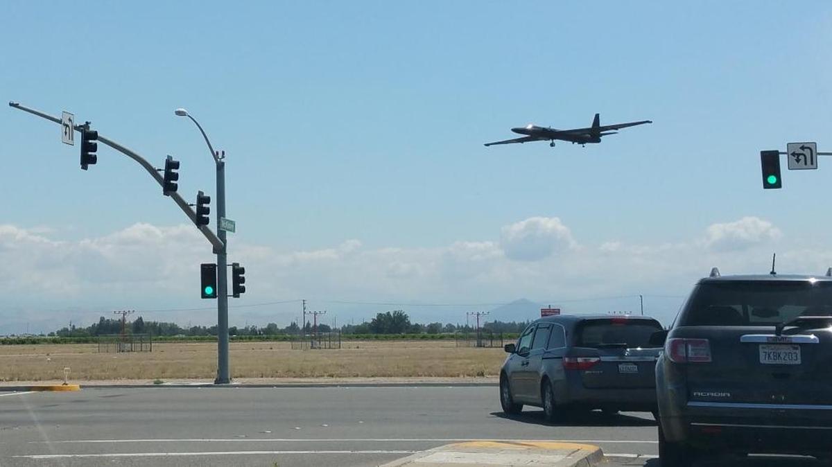 A U-2 airplane, formerly the apex of American military spy planes, makes a low-level flyover above Clovis Avenue and Fresno Yosemite International Airport at about noon Thursday. Pilot and amateur photographer Dean Kasparian of Fresno snapped a photo of the aircraft as he was driving on McKinley Avenue near Clovis Avenue, at the southeast corner of the airport.