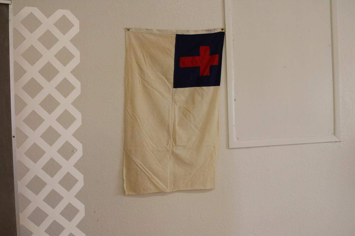 A flag at the East Fresno Baptist Church is similar to one that was burned during a break in at the church Sept. 9, 2018.