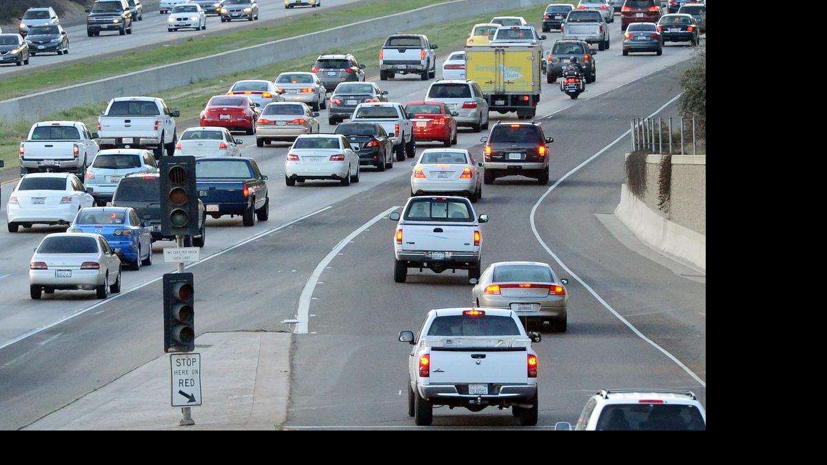 
Traffic merges onto southbound Highway 41 on the Shaw Avenue onramp in Fresno during the morning commute on Tuesday, March 11, 2014. State officials were in Fresno Wednesday discussing how to keep up with road repairs as traffic increases faster than maintenance money. 
