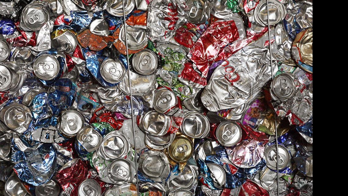 
Crushed and baled aluminum cans are seen at the Sunset Waste Systems facility in Fresno Thursday, January 31, 2013.
